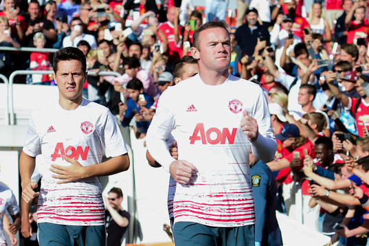 Manchester Uniteds Wayne Rooney före fotbollsmatchen