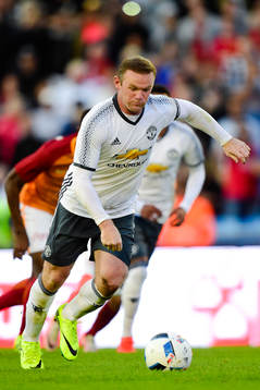 Manchester Uniteds Wayne Rooney gör 3-2 på straff