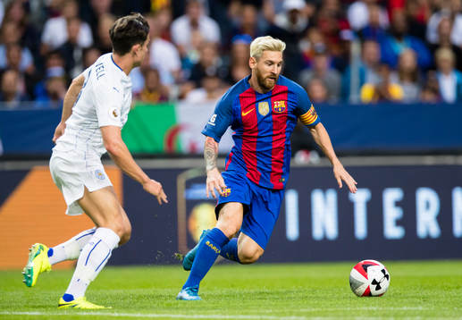 Barcelonas Leo Messi och Leicester Citys Ben Chillwell