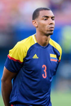 Colombias Deivy Balanta vid lineup innan fotbollsmatchen