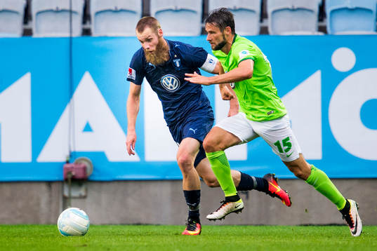 Malmö FFs Jo Inge Berget och Wolfsburgs Christian Träsch
