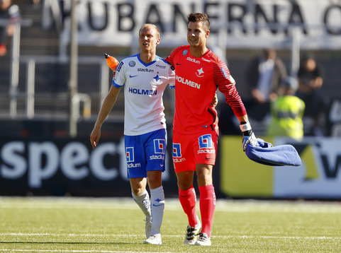 Norrköpings Andreas Johansson och målvakt Michael Langer