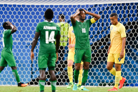 Nigerias Oghenekaro Etebo , Okechukwu Azubuike och John Obi