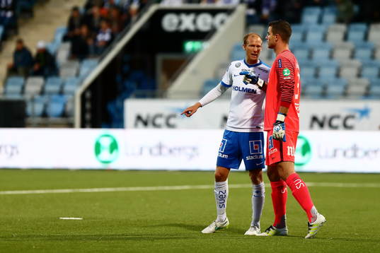 Norrköpings Andreas Johansson och målvakt Michael Langer