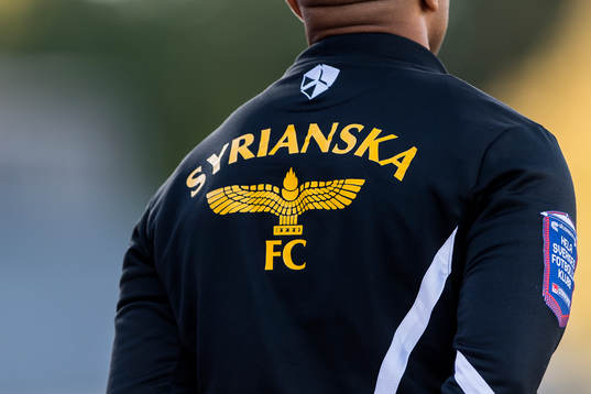 Syrianskas klubbemblem på en jacka