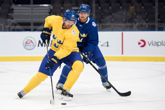 Sveriges Daniel Sedin och Hampus Lindholm
