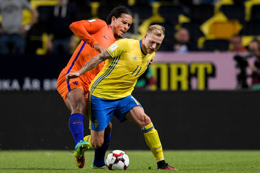 Hollands Virgil van Dijk och Sveriges John Guidetti