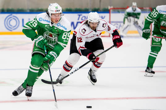 Rögles David Åslin och Malmö Redhawks Andreas Thuresson