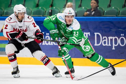 Malmö Redhawks Erik Andersson och Rögles Bryan Lerg