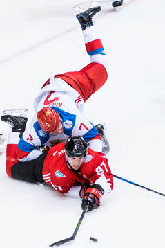 Kanadas Sidney Crosby och Rysslands Dmitry Kulikov