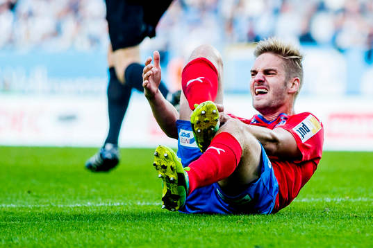 Helsingborgs Andreas Landgren grimaserar
