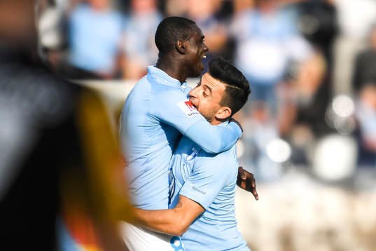 Malmö FFs Behrang Safari och Enock Kofi Adu jublar