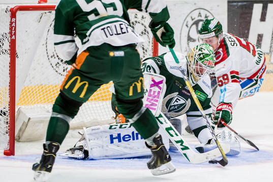 Färjestads målvakt Lars Haugen och Frölundas Simon