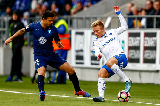 Norrköpings Nicklas Bärkroth och Malmö FFs Behrang Safari