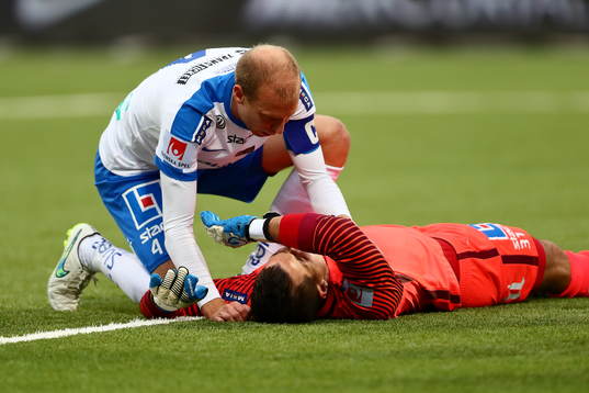 Norrköpings Andreas Johansson och målvakt Michael Langer