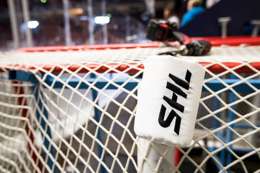 Vatten flask hållare på målet  ishockeymatchen i SHL