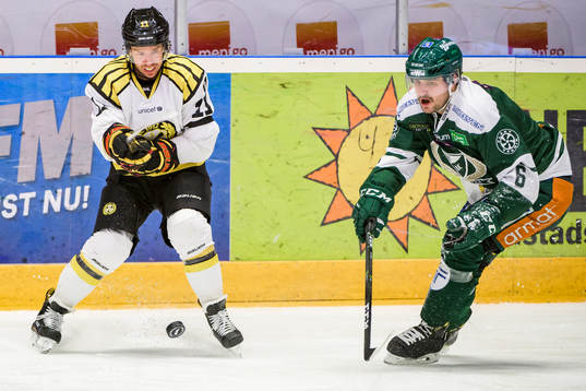 Brynäs Kevin Clark och Färjestads Mikael Wikstrand