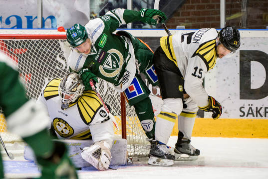 Brynäs målvakt David Rautio, Färjestads Joakim Nygård