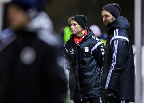 s tränare Johan Norberg (v) och Jens Hedström (h)