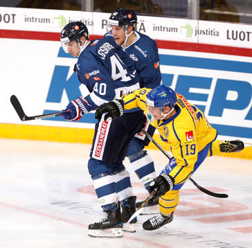 Finland¥s Jarno Koskiranta, Finland¥s Ilari Melart and