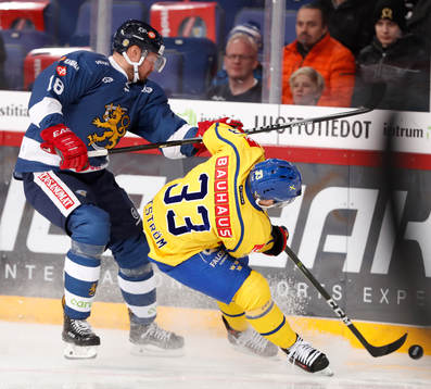 Finland´s Jesse Joensuu (L) and Sweden´s Linus Hultström