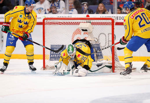 Sweden¥s goalie Niklas Svedberg and Sweden¥s Joel