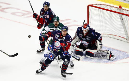 Linköpings Niclas Lundgren och målvakt Marcus Högberg