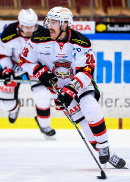 Malmö Redhawks Jens Olsson med pucken