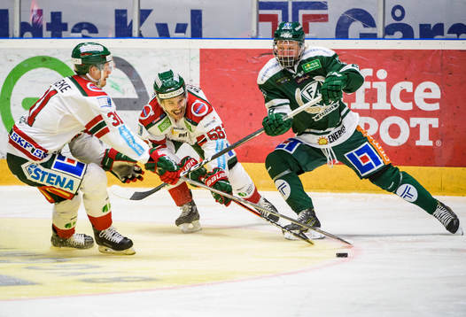 Frölundas Nicklas Lasu och Jonathan Sigalet i en kamp med