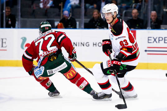 Malmö Redhawks Fredrik Händemark och Frölundas Patrik