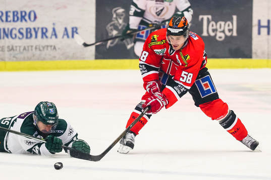 Färjestads Milan Gulas och Örebros Michael Haga