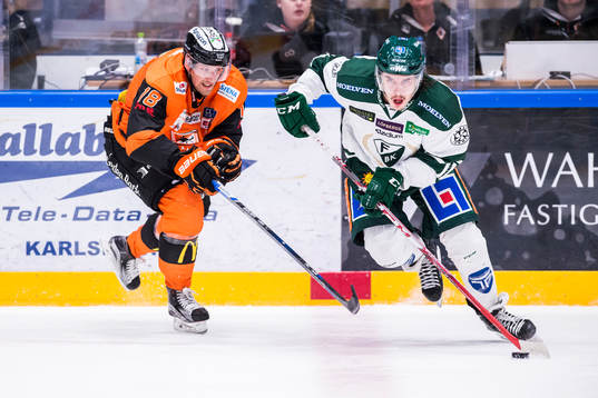 Karlskronas Emil Larsson och Färjestads Joakim Nygård i