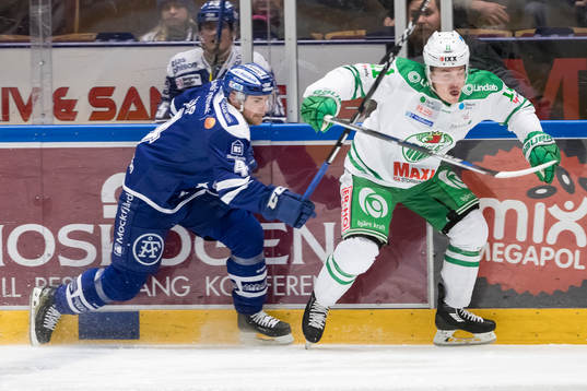 Leksands Nichlas Torp och Rögles Bryan Lerg  i