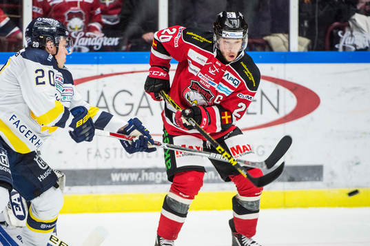 s Lawrence Pilut och Malmö Redhawks Erik Forssell i