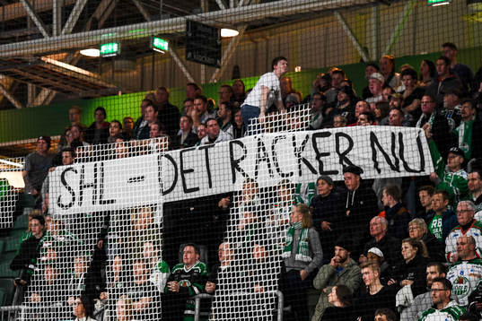 Rögles supportrar med banderoll