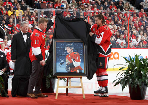 Daniel Alfredsson has his jersey with his number 11 retired