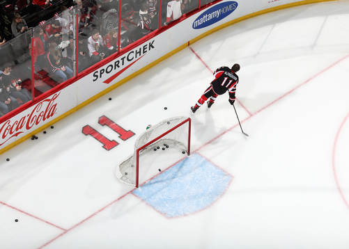 Daniel Alfredsson has his jersey with his number 11 retired