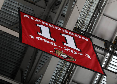 Daniel Alfredsson has his jersey with his number 11 retired