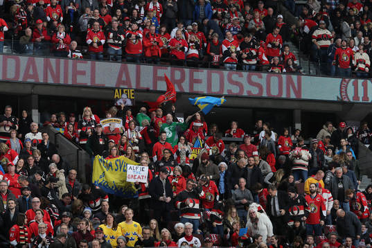 Daniel Alfredsson has his jersey with his number 11 retired