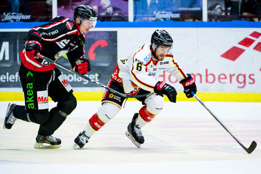 Malmö Redhawks Lars Bryggman och Luleås Craig Schira