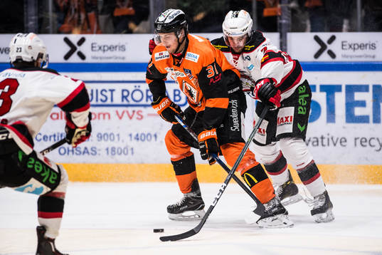 Karlskronas Marcus Paulsson  och Malmö Redhawks Nils