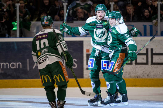 Färjestads John Persson och Linus Persson jublar