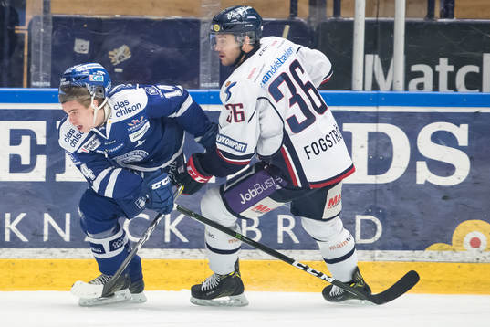 Leksands Oskar Lang och Niklas Fogström  i ishockeymatchen