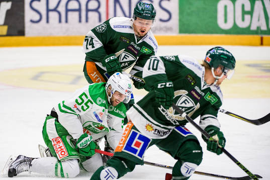 Färjestads Rasmus Asplund och Rögles Felix Schütz