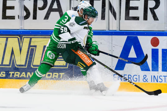 Rögles Almen Bibic och Färjestads Anton Gustafsson i kamp