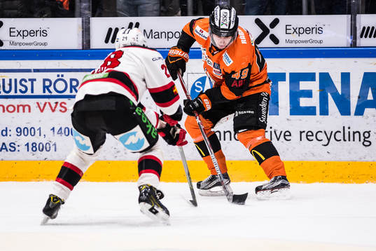 Malmö Redhawks Jens Olsson och Karlskronas Filip Cruseman