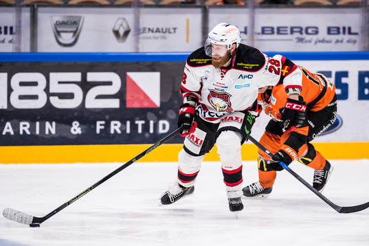 Malmö Redhawks Jens Olsson  och Karlskronas Joel Kellman