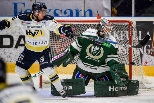 s Filip Sandberg  och Färjestads målvakt Stefan Steen