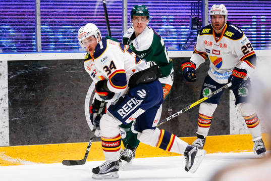 Djurgårdens Daniel Brodin och Färjestads Joel Eriksson Ek