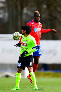 Helsingborgs Edwin Gyimah och Kristianstads Antonio Rojas